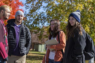 Three students standing outside on the Landmark College 